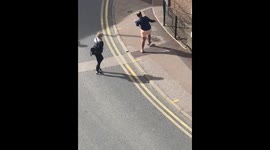 Drunk person staggers onto busy road in London