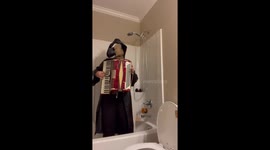Accordion performance in toilet
