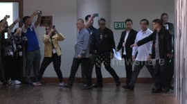 Filipino 'Son of God' cult leader emerges from police cell for hearing