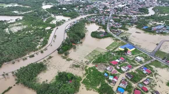 Aerial footage shows Philippines town submerged in Tropical Storm Trami ...
