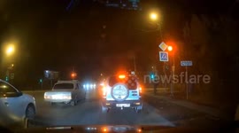 Russia: Driver Speeds Into Oncoming Traffic, Rams Two Cars At Red Light