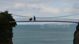 Towan Island, Reputedly Britain's smallest inhabited Island, Everything goes over the suspension bridge. Newquay, Cornwall, UK