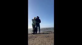 Butt-Scootin' Pup Spoils Beach Photo