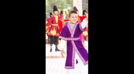 Uygur boy shows dancing talent