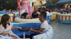 Thrills and laughter at Happy Valley's spinning teacups in China