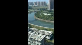 A Man Sits on the River