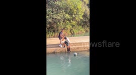 China: Boys were playing basketball and the ball accidentally fell into the river