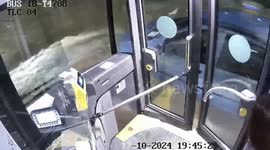 Bus driver saves father and child stranded in their car on flooded road