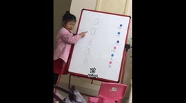 Young girl demonstrates pronunciation skills in China