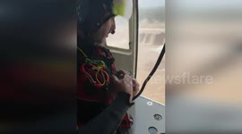 Spain: Valencia Firefighters Save Stranded Drivers from Flooded Vehicle in Alzira