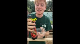 Lad grimaces as he swigs from world's strongest beer that is 75% alcohol