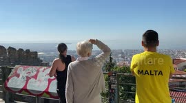 Sightseeing Tour Interrupted as Unexpected, Sky-Dancing F-16 Jet Steals Tourists' Attention in Greece