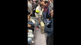 Elderly man entertains subway passengers in Buenos Aires