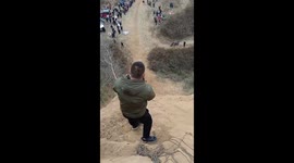 Motorcycle climb attempt fails at Zhengzhou