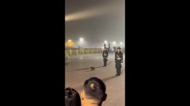 Cat interrupts police parade at Tiananmen Square in Beijing