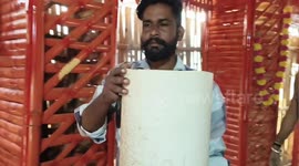 Snake cather resque a dangerous snake in hut, Haryana