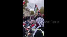 UK: Protesters demonstrate outside Downing Street to commemorate the over 42,000 Palestinian men, women, and children who have been killed by Israel