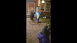 Trick-or-treating kids amazed by homeowner's Count Dracula puppet