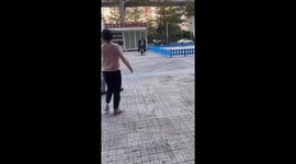 Motorcyclist crashes into mirror wall in Jiangsu Province