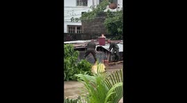 Soldiers rescue dogs from flooding in Bula, Camarines Sur