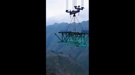 First steel-truss beam hoisted on Huajiang Grand Canyon Bridge