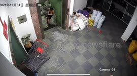 Toddler plays prank on grown man by repeatedly opening lift door while hiding behind wall