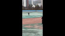 Father's ball kick hits daughter on head in Liaoning Province, China