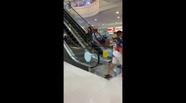 Person stands on stuck escalator in Robinsons Place Imus, Cavite