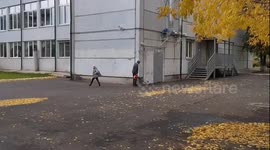 Janitor rollerblades while cleaning school yard in Krasnoyarsk