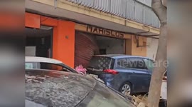 Spain: Community Cheers as Police Cadets Tackle Valencia's Storm Dana Aftermath