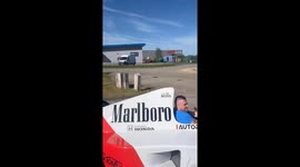 Race fanatic drives real F1 car through streets in France