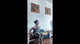 Chinese woman shows off her impressive pet raven