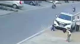 China: Child Miraculously Survives Being Run Over by Car