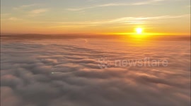 Spectacular Fog Scenes With Factory Chimney Above Fog Inversion And Sunset - Drone Footage