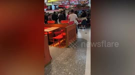 Angry father attacks dog for 'scaring his child' at shopping mall in China