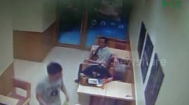 Man steals woman's while she plays on phone