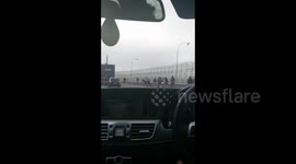 Police firing tear gas at migrants in Calais