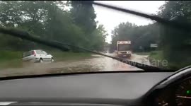 Extreme flooding on a country road in Chelmsford, UK