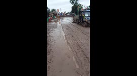 Muddy and quiet start to Glastonbury Thursday