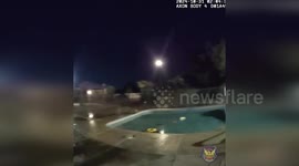 US: Police Rescue Driver Trapped in Car Submerged in Pool