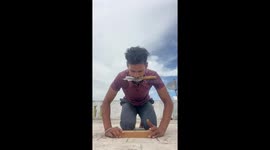 Balancing on knife edge supported by nail edge in Tamil Nadu, India