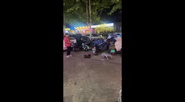 Real dog and robotic dog face off on the street in China