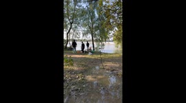 Strong wave hits shore in Jinhua, China, surprising park visitors