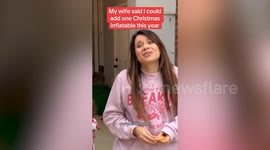 Man surprises his wife by putting a 20ft inflatable penguin in their garden