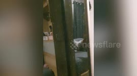 Creepy moment wardrobe mirror breaks by itself