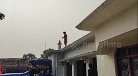 Protester jumps from police station roof during stand-off with officers