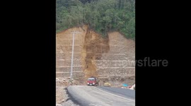 moment Seconds Seconds of the natural disaster, a large landslide in Indonesia closed the main road for thousands of residents