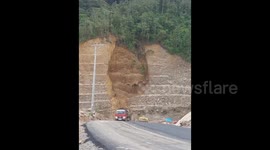moment Seconds Seconds of the natural disaster, a large landslide in Indonesia closed the main road for thousands of residents