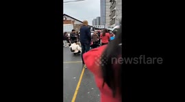 Parents apprehend motorist who rammed into students outside primary school in China