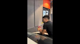 Drunk friend delivers flowers to McDonald's cashier in Mendoza, Argentina